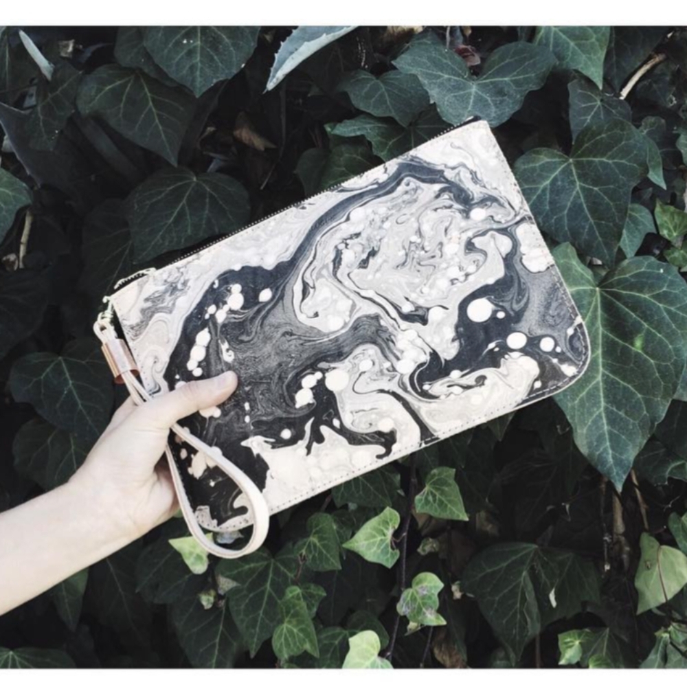 Hand marbled leather clutch in black and tan
